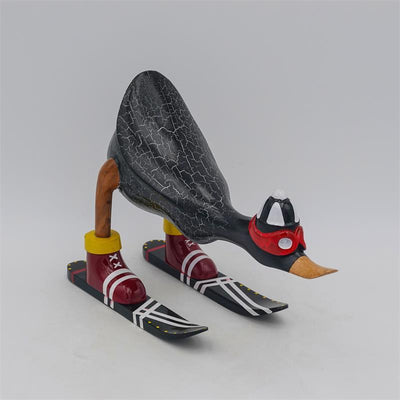 Canard "Fabian" - petit, penché en avant, gris foncé avec des skis