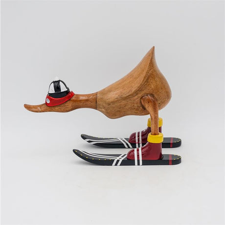 Canard "Mara" - petit, brun penché avec des skis