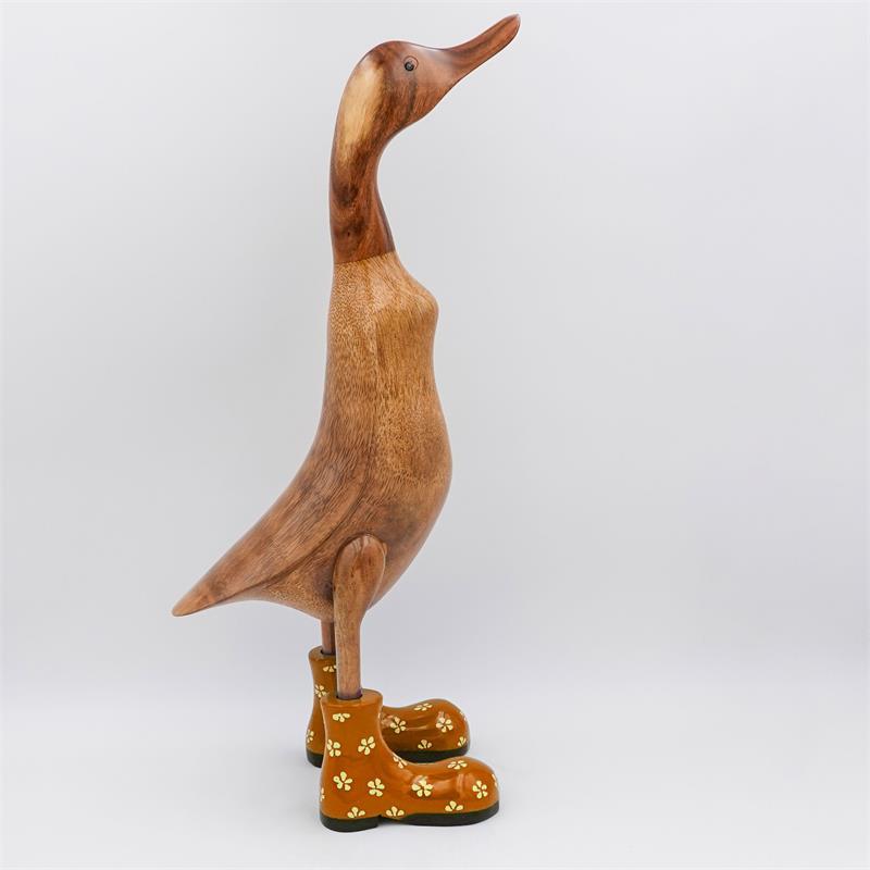 Canard « Bertha » énorme, brun, dressé, doré avec des fleurs