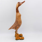 Canard « Bertha » énorme, brun, dressé, doré avec des fleurs