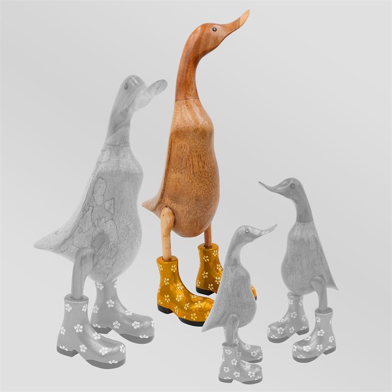 Canard « Bertha » énorme, brun, dressé, doré avec des fleurs